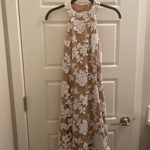 Beautiful beaded and lace swing dress by Dress the Population